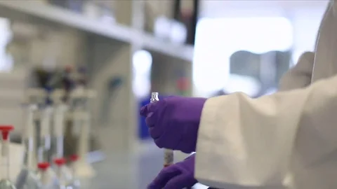 Pipette Filling Vial with Solution Stock Footage 69087989