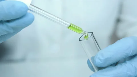Pipette with a green solution. Stock Footage 238835179