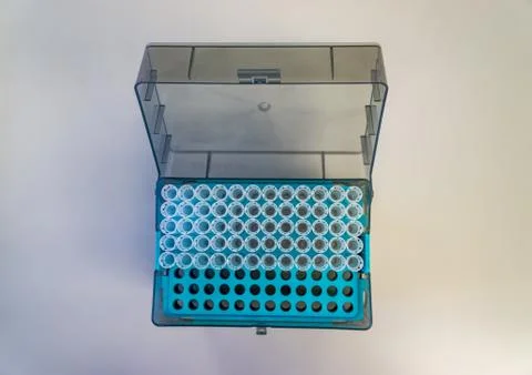 Pipette tips from a laboratory in a container top view. Stock Photos