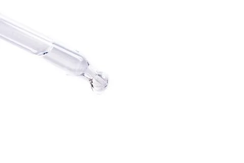 Pipette with water on white background Stock Photos