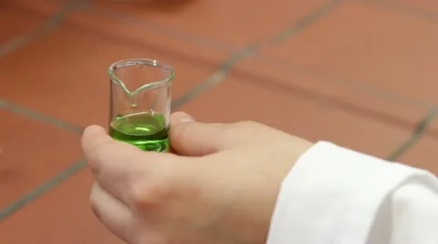 Pipetting green specimen Stock Footage 21782953