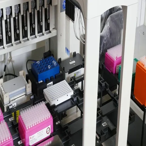 Pipetting robot in a gene lab Stock Footage 69406020