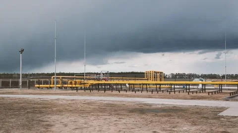 Piping connected by flanges for gas distribution in a modern compression station Stock Footage 222955400