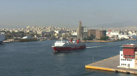 Piraeus red ship sails out Stock Footage 692328