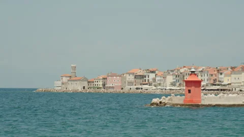​Piran Coastline With Red Lighthouse And Town View Stock Footage 341464317