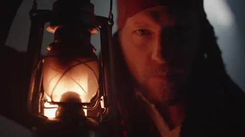 Pirate and moonlight close up with lantern Stock-Footage 142549411