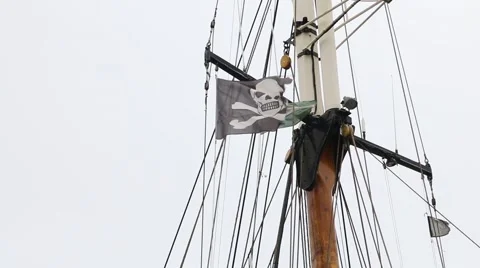 Pirate flag in mast of rocking ship Stock Footage 48249196