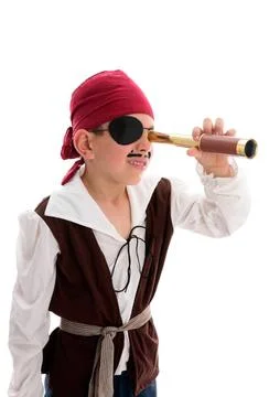 Pirate looking through scope A young boy pirate looking through a monoscop... Stock Photos