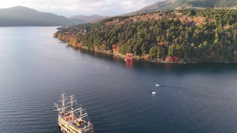 Pirate Ship | Lake Ashi | Hakone Town | Autumn - 4K Aerial Video Stock Footage 329054717