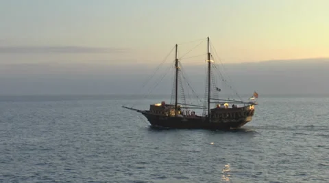 Pirate ship on open sea at sunset Stock Footage 35462285