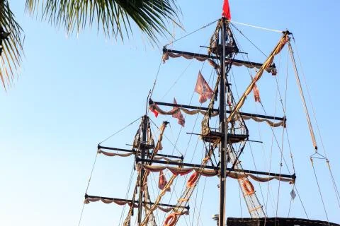 Pirate ship posts and flags Stock Photos