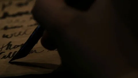 Pirate writes on parchment with a quill Stock Footage 101112470