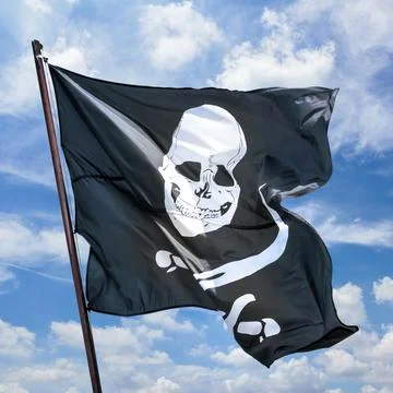 Pirates flag in the wind Stock Photos