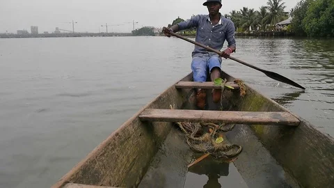 Pirogue driver on the Wouri, Douala background Video stock 80968593