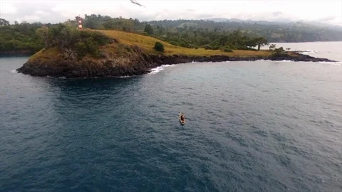 Pirogue under the lighthouse Stock Footage 87141641