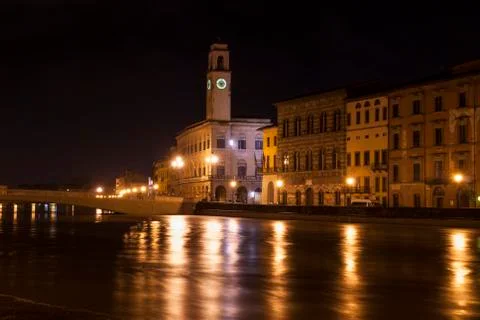 Pisa by night from the river. Stock Photos