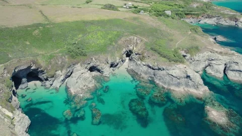 Piskies Cove and HMS Warspite Cliffs from a drone, Penzance, Cornwall, England Stock Footage 201212423