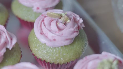 Pistachio Cupcake being finished Stock Footage 321653822