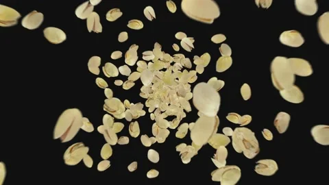 Pistachio explosion on black background Stock Footage 197014360
