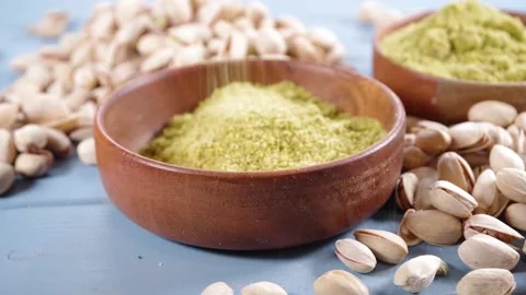 Pistachio flour with whole nuts Video stock 169938142