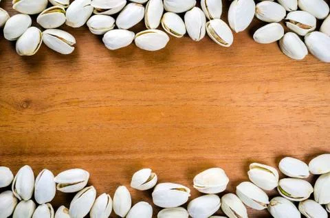 Pistachio frame background Stock Photos