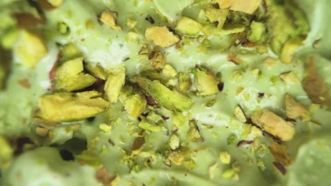 Pistachio Ice Cream Macro with Raw Nut Topping Stock Footage 313548645