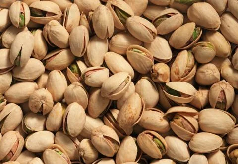 Pistachio nut background Stock Photos