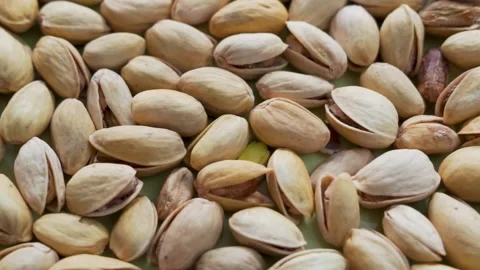 Pistachio Nuts, Close-up, Rotation. Background of Pistachio Nuts. Pistachio Nuts Stock Footage 155332379