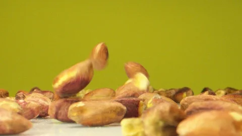 Pistachio Nuts Falling in Macro Extreme Slow Motion Stock Footage 126706060