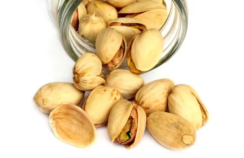 Pistachio nuts isolated Stock Photos
