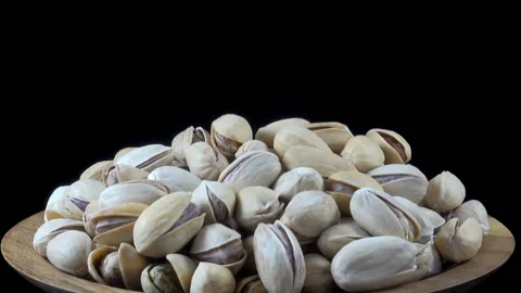 Pistachio nuts on a plate. Stock Footage 158909610