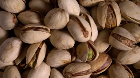 Pistachio nuts rotating, overhead shot Stock Footage 56068514