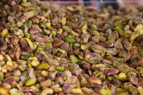 Pistachio nuts without shell background. Peel off pistachio Stock Photos