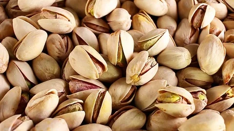 Pistachio, pistachios texture pattern rotate rotating plate Stock Footage 98790268