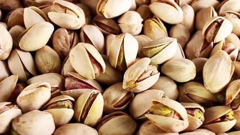 Pistachio, pistachios texture pattern rotate rotating plate Video stock 98790322