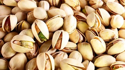 Pistachio texture. Nuts. Green fresh pistachios as texture. Roasted salted Video stock 96543712