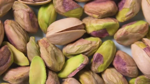 Pistachios with and without shell closeup 動画素材 169044322