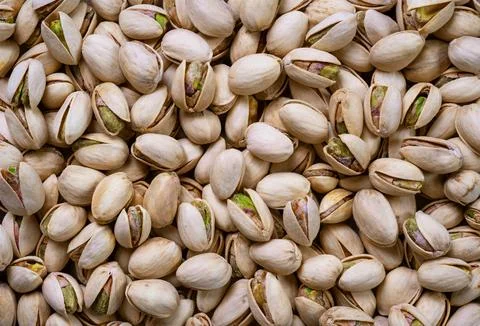 Pistachios background Stock Photos