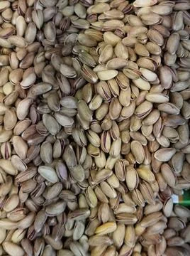 Pistachios in bulk but isolated Stock Photos