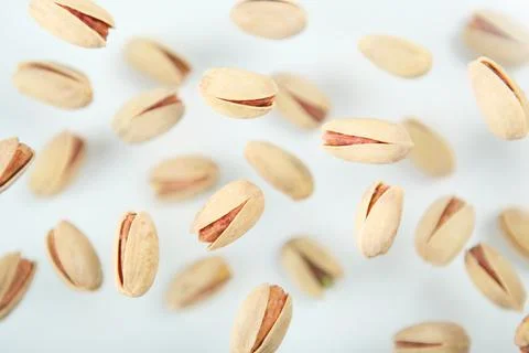 Pistachios close-up on the table Stock Photos