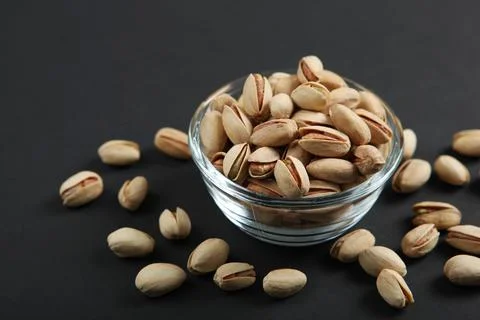 Pistachios close-up on the table Stock Photos