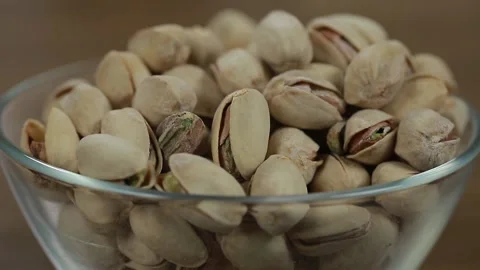 Pistachios in a plate Video stock 154659273