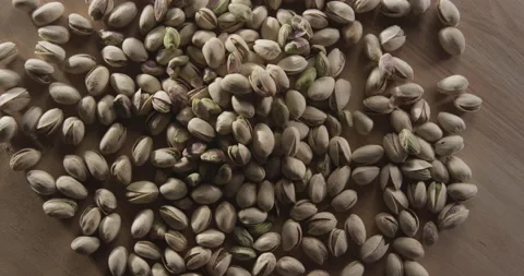 Pistachios on table Stock Footage 146429673