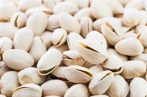 Pistachios on white background isolate Stock Photos