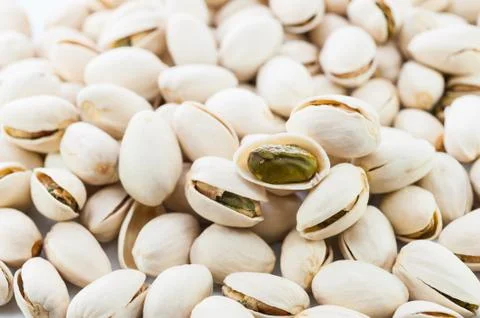 Pistachios on white background isolate Stock Photos