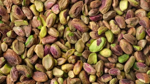 Pistachios without shell top view, sliding shot. Healthy snack Pistachio nuts Stock Footage 172020992