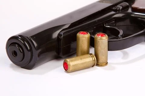 Pistol with ammo isolated Stock Photos