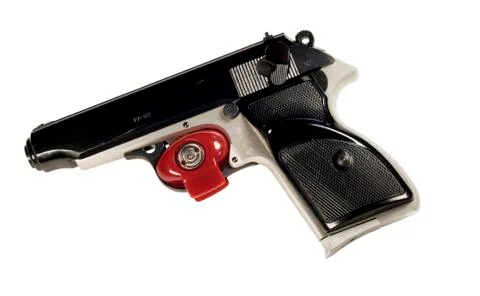 Pistol and trigger lock Stock Photos
