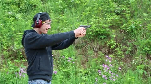 Pistol being fired Stock Footage 20580874