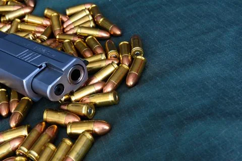 Pistol. bullet background Stock Photos